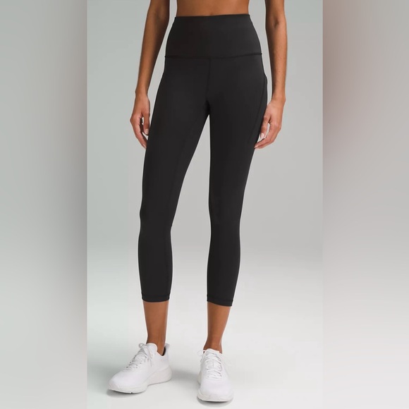 lululemon athletica Pants - Lululemon Wunder Train Black Leggings Crop With Pockets mesh details Size 4